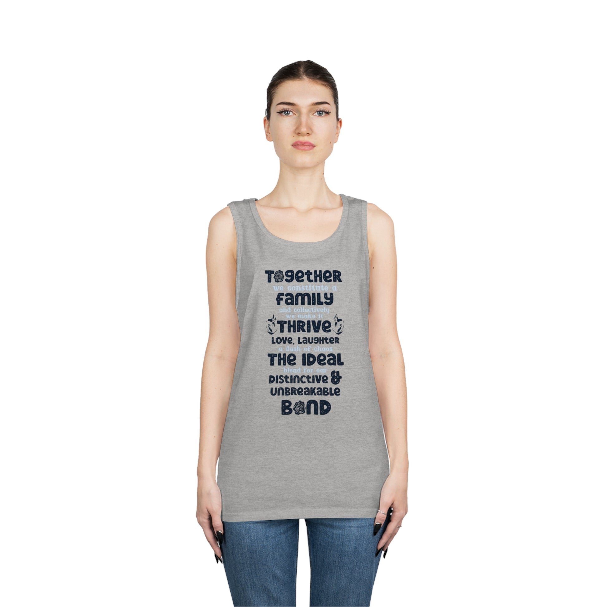 Front View On The Female Model In Sport Grey Color of the "Thriving Unity - Unisex Heavy Cotton Tank Top featuring a typographic design with the quote "Together, we constitute a family, and collectively, we make it thrive. Love, laughter, and a dash of ch